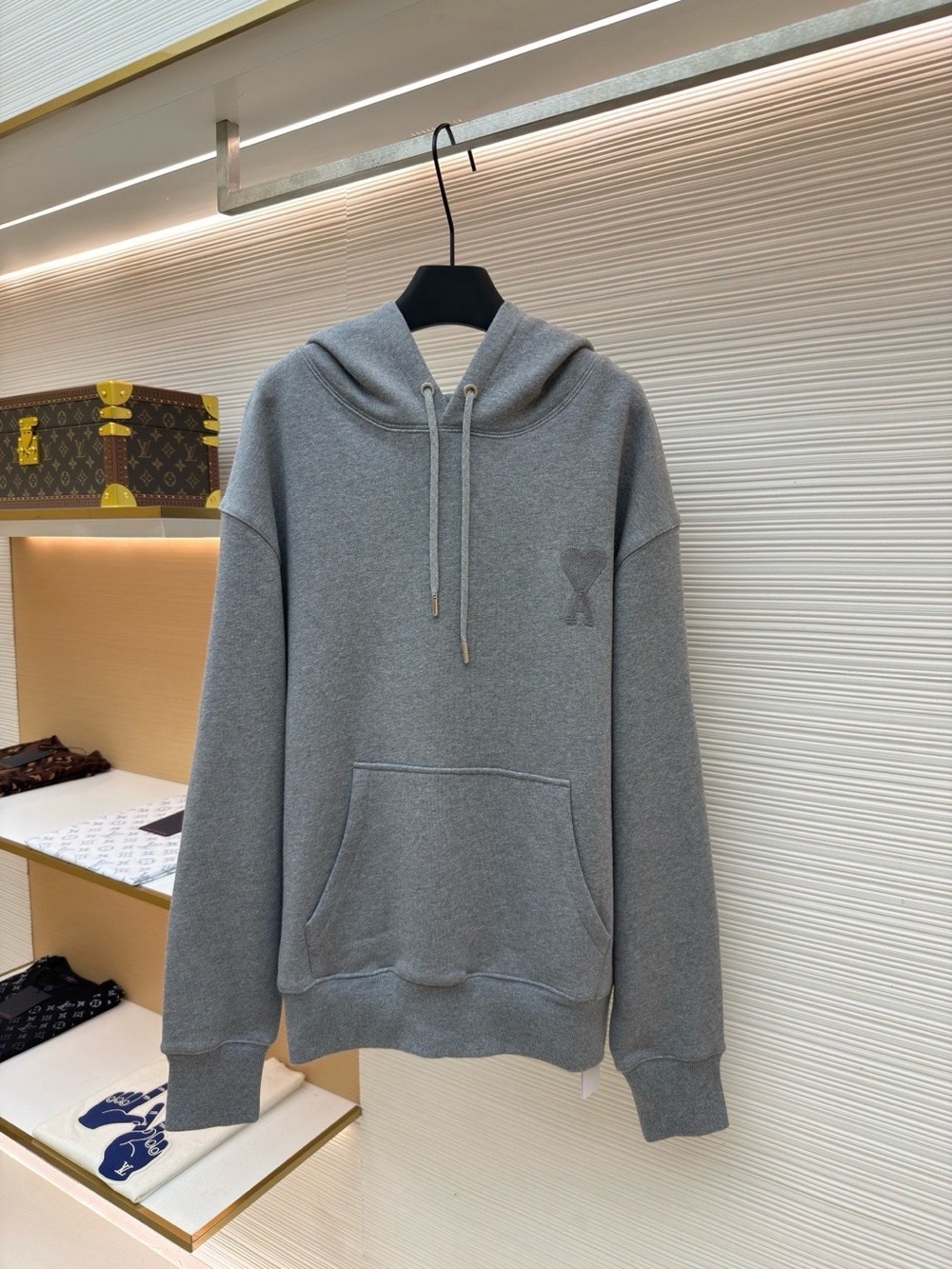 Ami Gray Pullover Hoodie with Subtle Chest Emblem